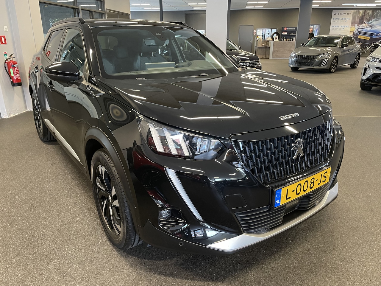 Peugeot 2008 - 1.2 PureTech GT NAVIGATIE-DRAADLOZE TELEFOONLADER-CLIMATE CONTROL - AutoWereld.nl