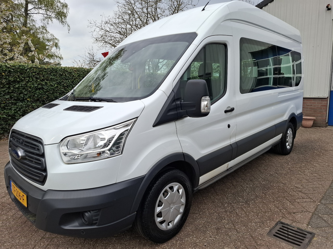 Ford Transit Kombi - 2.0 TDCI L2H3 28450.- INCL BTW 9-PERSOONS ROLSTOELVERVOER 130PK - AutoWereld.nl