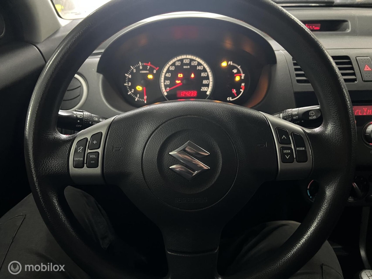 Suzuki Swift - (racing/Angel eyes) - AutoWereld.nl