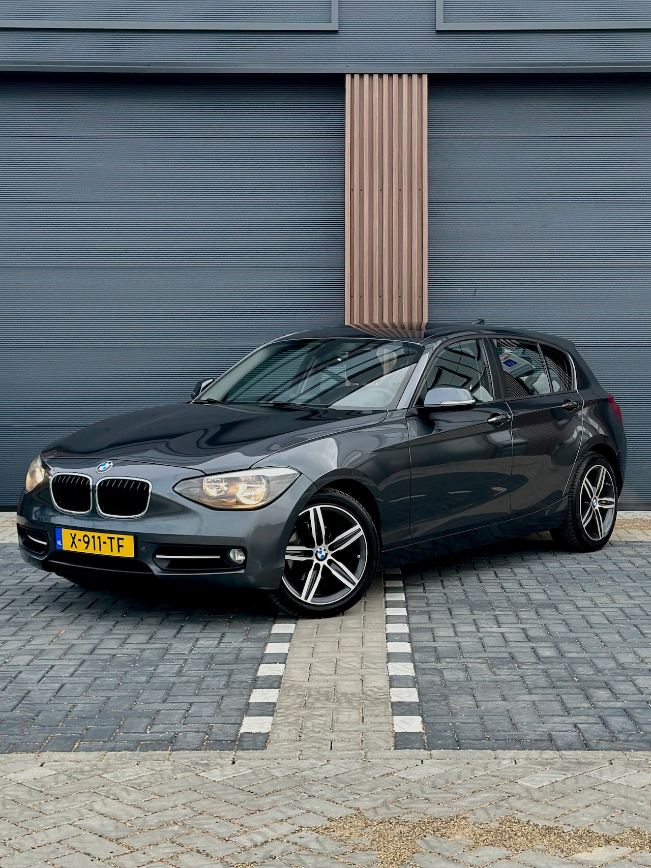 BMW 1-serie - 116i M Sport High Executive Schuifdak | Navigatie | Cruise Control - AutoWereld.nl