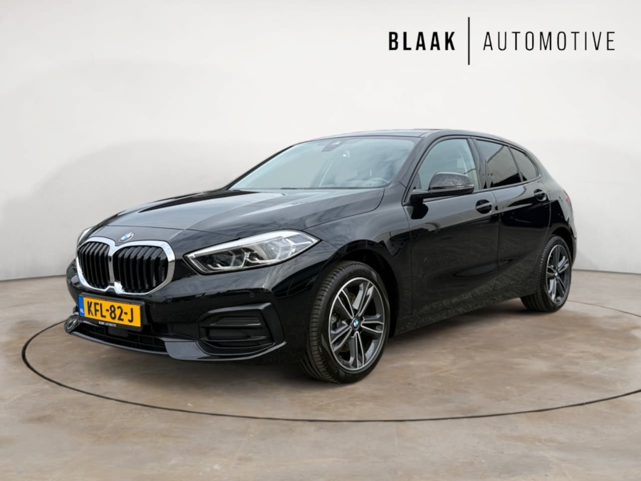 BMW 1-serie - Limousine 118i Sport Line - AutoWereld.nl