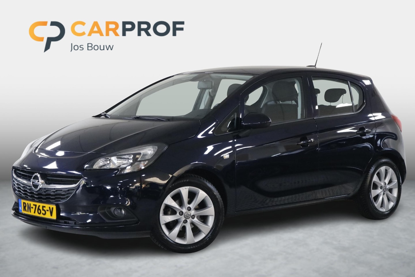 Opel Corsa - 1.4 Favourite All-Seasons | Airco | Carplay | DAB | Cruise | Nette auto! - AutoWereld.nl