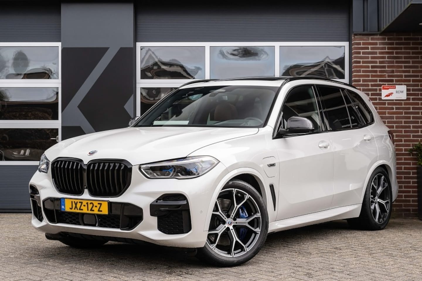 BMW X5 - xDrive45e M-Sport | Panorama | Harman/Kardon | Head-Up | 4-Wielbest. | Comfort Seats | 21' - AutoWereld.nl