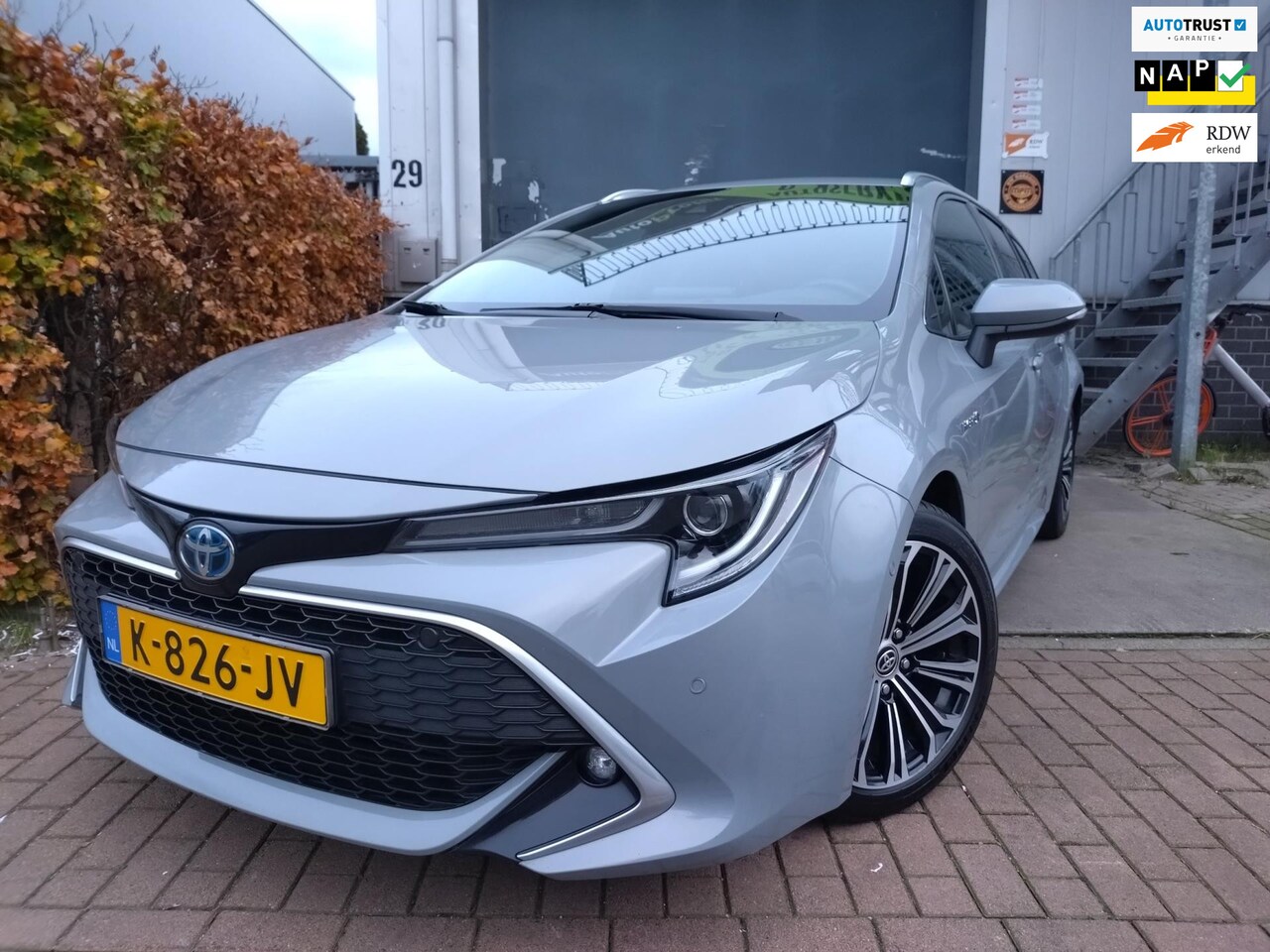 Toyota Corolla Touring Sports - 1.8 Hybrid Executive HUD - AutoWereld.nl