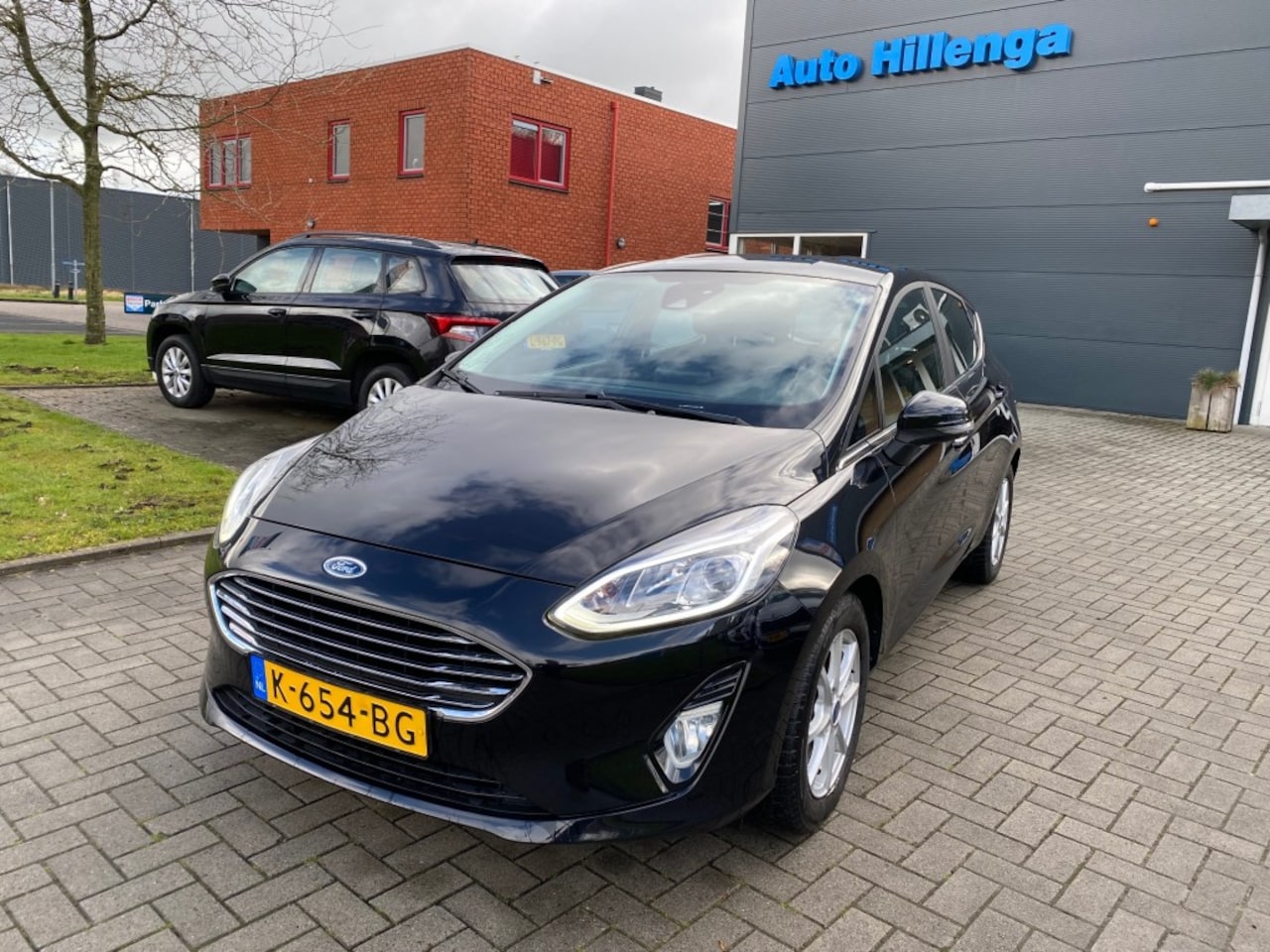 Ford Fiesta - 1.0 ECOB.HY. TIT. - AutoWereld.nl