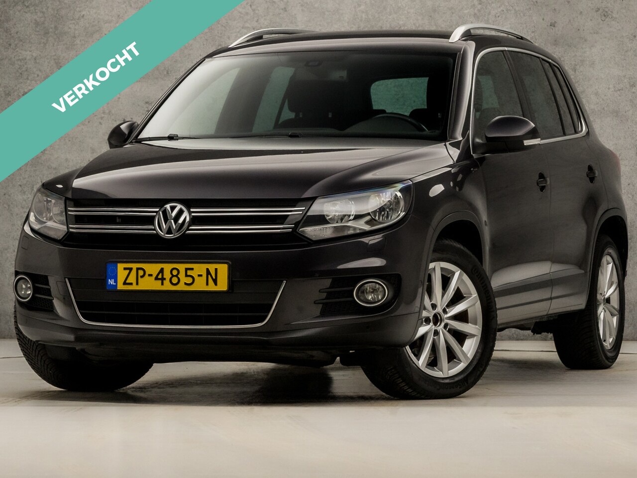 Volkswagen Tiguan - 1.4 TSI Sport (NAVIGATIE, CLIMATE, CAMERA, STOELVERWARMING, SPORTSTOELEN, ZWART HEMEL, GET - AutoWereld.nl