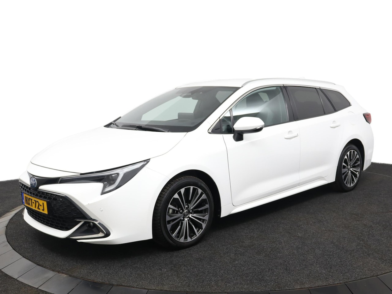 Toyota Corolla Touring Sports - 1.8 Hybrid 140 PK First Edition | 10 jaar Fabrieksgarantie* | Navigatie | Stuur/Stoelverw. - AutoWereld.nl