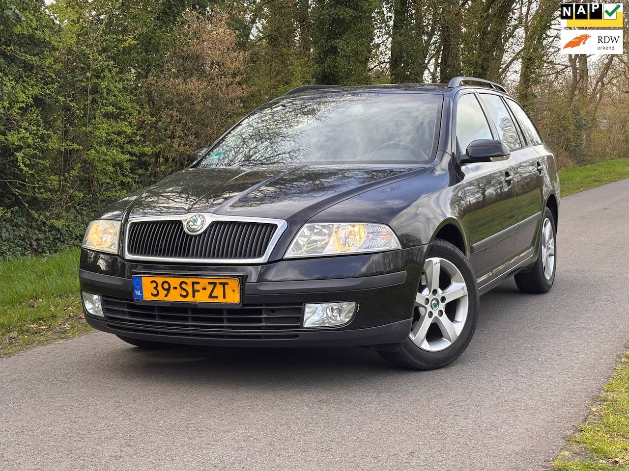 Skoda Octavia Combi - 1.6 FSI Elegance | Airco + Cruise control Nu € 1.450,- !!! - AutoWereld.nl