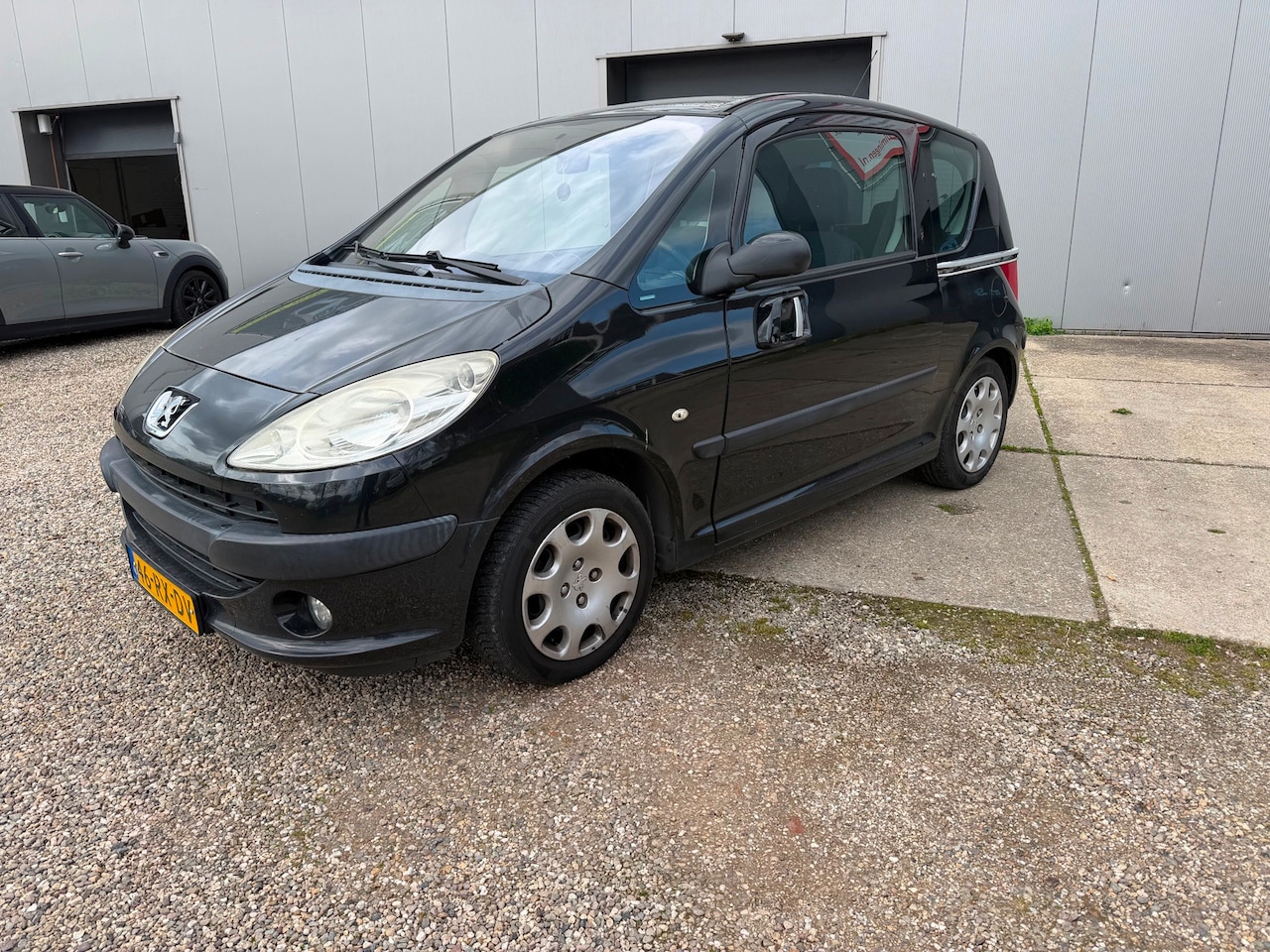 Peugeot 1007 - 1.4 Gentry met airco - AutoWereld.nl