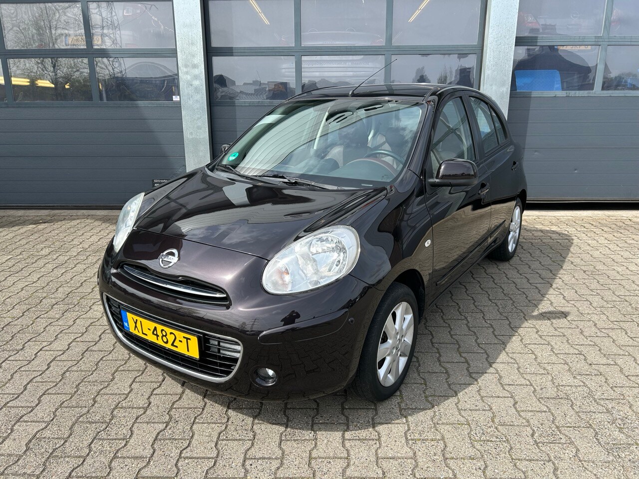 Nissan Micra - 1.2 Tekna 1.2 80pk Tekna - AutoWereld.nl