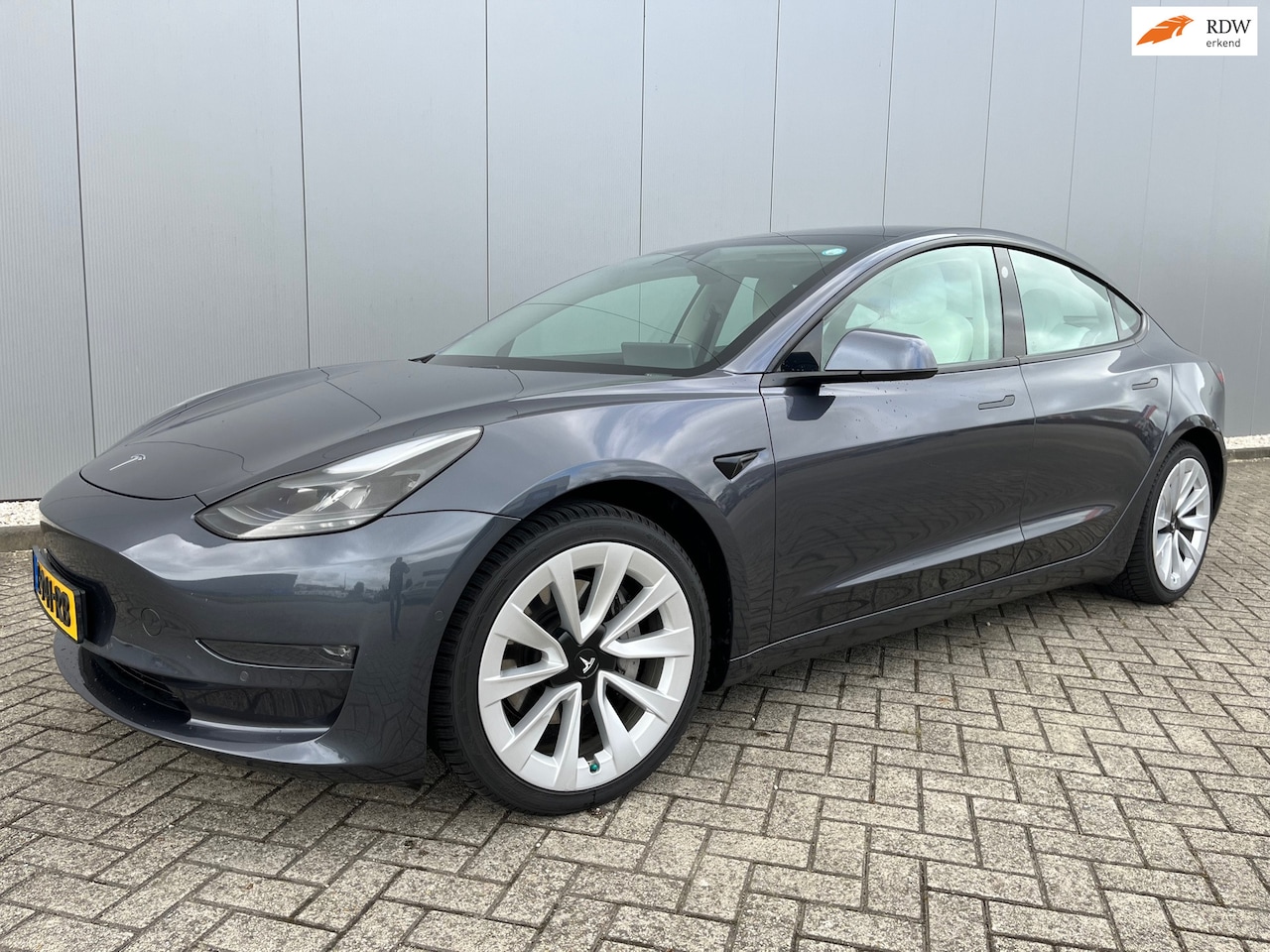 Tesla Model 3 - Long Range RWD Long Range AWD 75 kWh/ SOH 88%/ 15619 netto - AutoWereld.nl