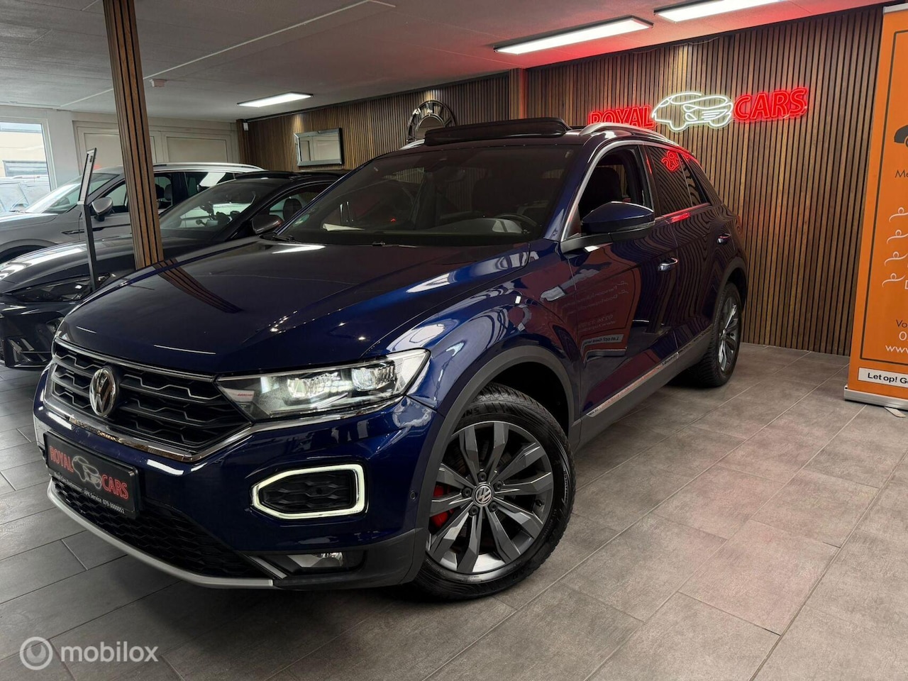 Volkswagen T-Roc - 1.5 TSI Sport/ PANO/ ACC / B.SPOT/ A.CAMERA - AutoWereld.nl