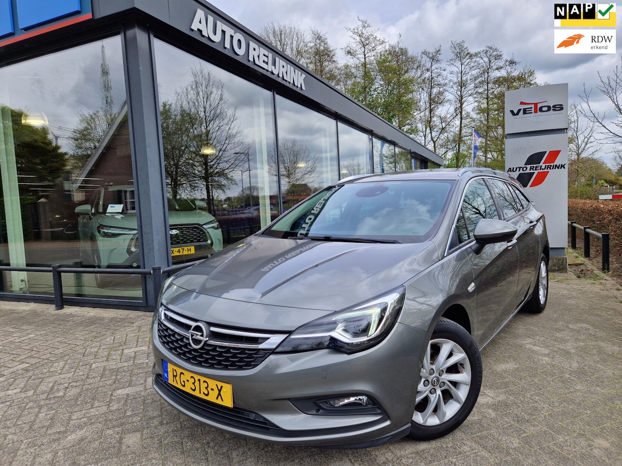 Opel Astra Sports Tourer - 1.4 Innovation/TREKHAAK/CAMERA/KEYLESS/PARK.SENS V+A - AutoWereld.nl