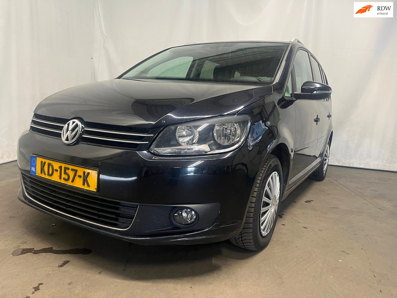 Volkswagen Touran - 1.6 TDI Highline BlueMotion - Schade - AutoWereld.nl