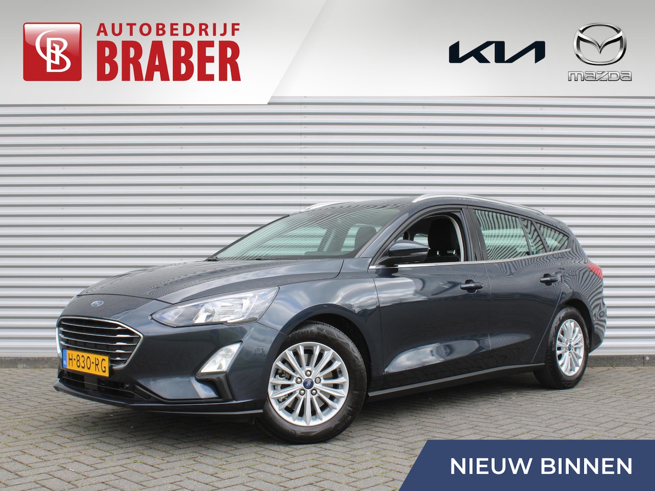 Ford Focus Wagon - 1.0 EcoBoost Titanium Business | Stuur-/stoel-/voorruitverwarming | Clima | Navi | Carplay - AutoWereld.nl