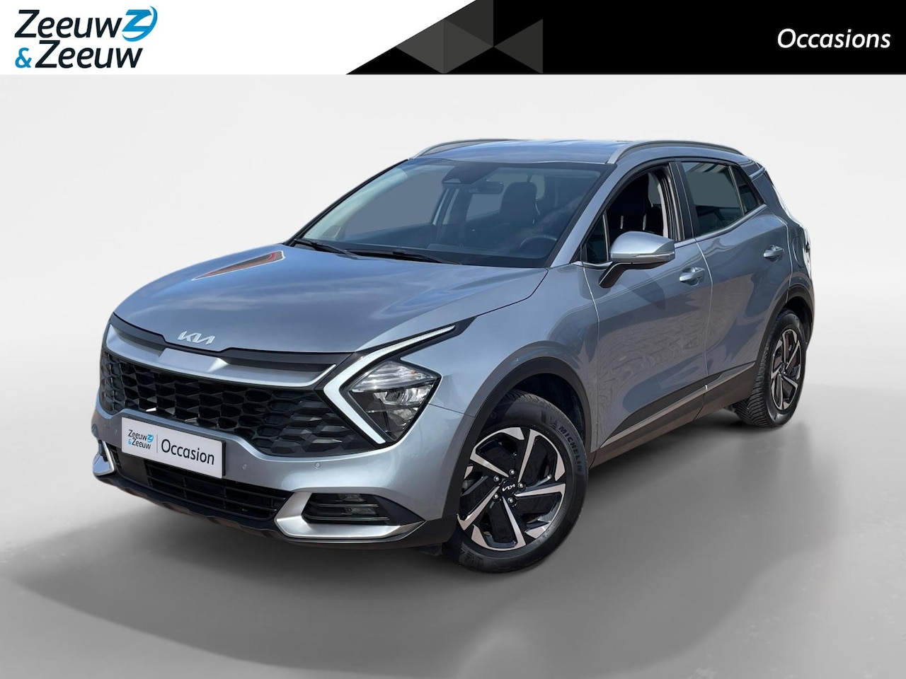 Kia Sportage - 1.6 T-GDi Hybrid DynamicLine *Automaat*Navi+Camera*Climate*Parc Assist*Cross Climate Bande - AutoWereld.nl