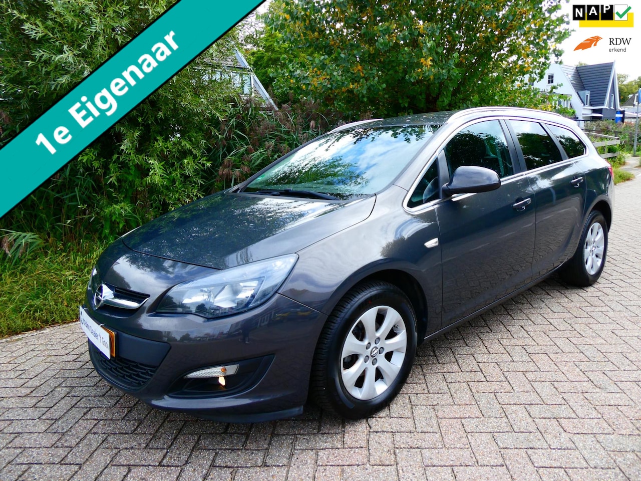 Opel Astra Sports Tourer - 1.4 Turbo 120pk Airco Cruise Navi PDC 1e eigenaar - AutoWereld.nl