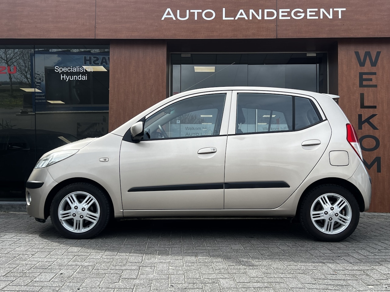 Hyundai i10 - 1.25i i-Catcher | MEENEEMPRIJS MET NIEUWE APK | Radio | Airco | CD/ Aux | LM velgen - AutoWereld.nl
