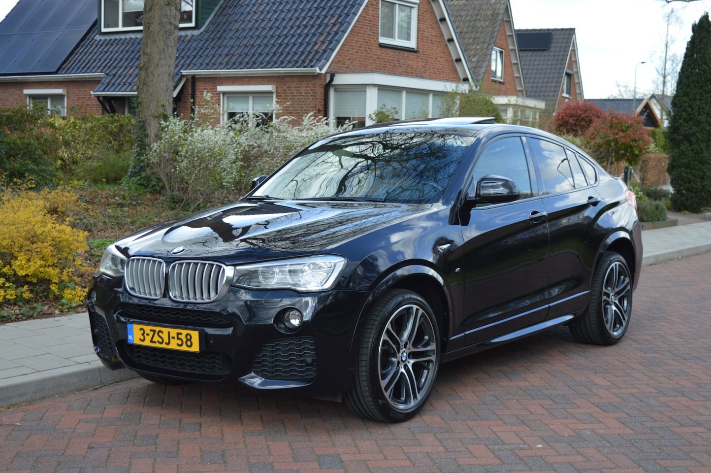 BMW X4 - XDrive28i High Exe M-pakket/schuifdak - AutoWereld.nl