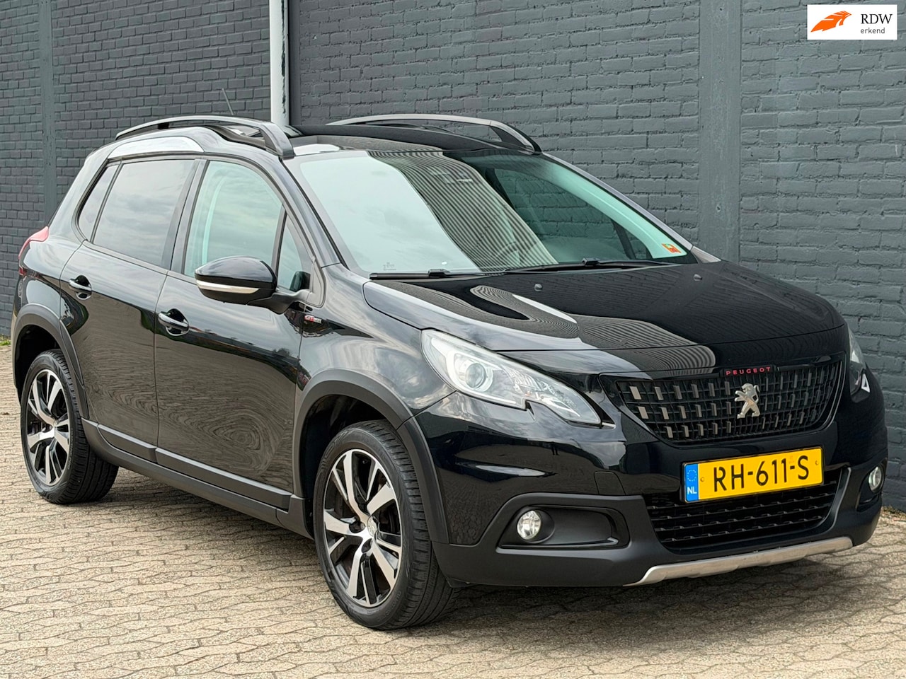 Peugeot 2008 - 1.2 PureTech GT-line CAMERA PDC LEER NAVI CLIMA CRUISE AUTOMAAT - AutoWereld.nl