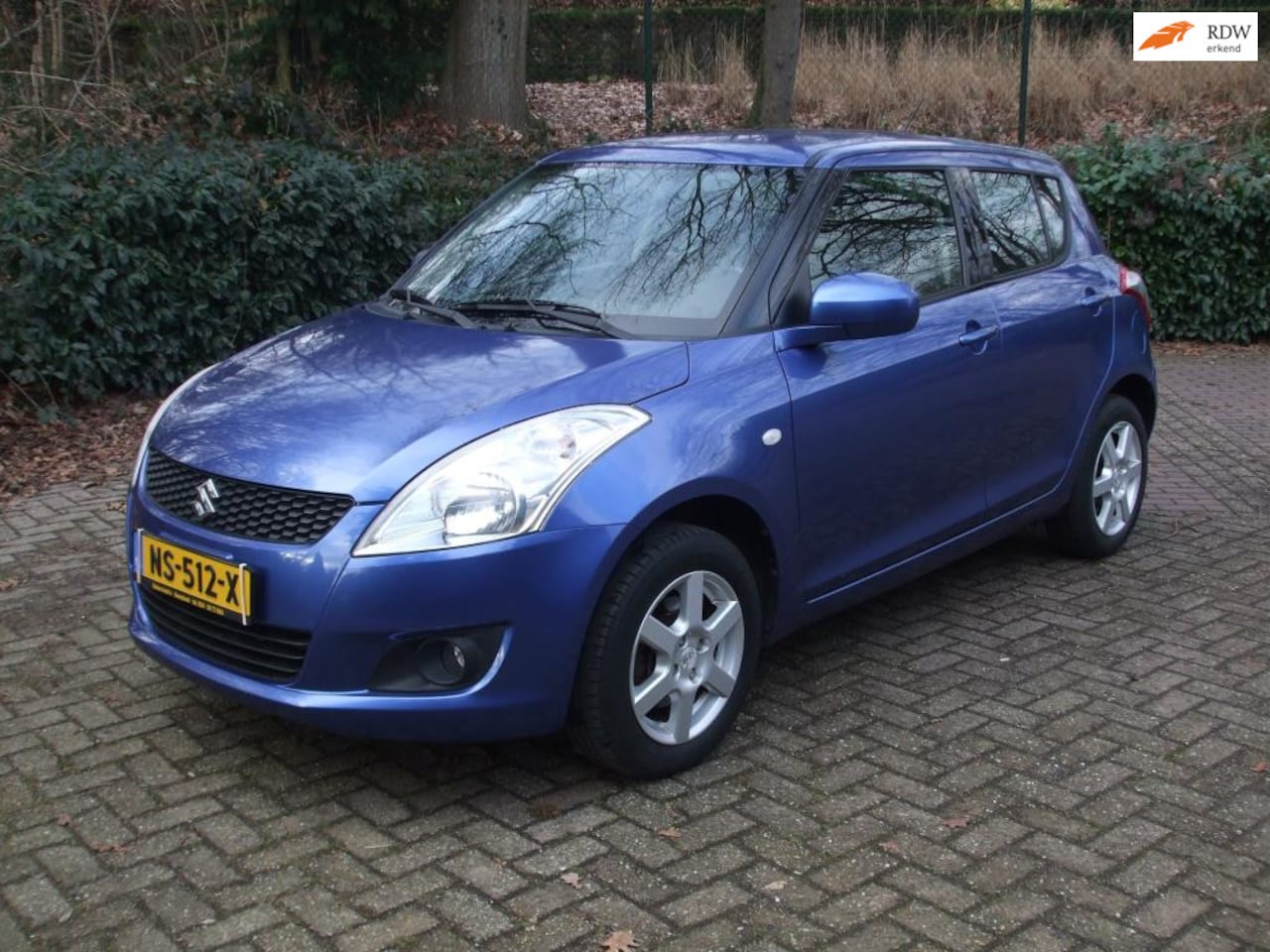 Suzuki Swift - 1.2 Dynamic Allgrip 4VWD EASSS airco 102 dkm 5 drs blauw - AutoWereld.nl