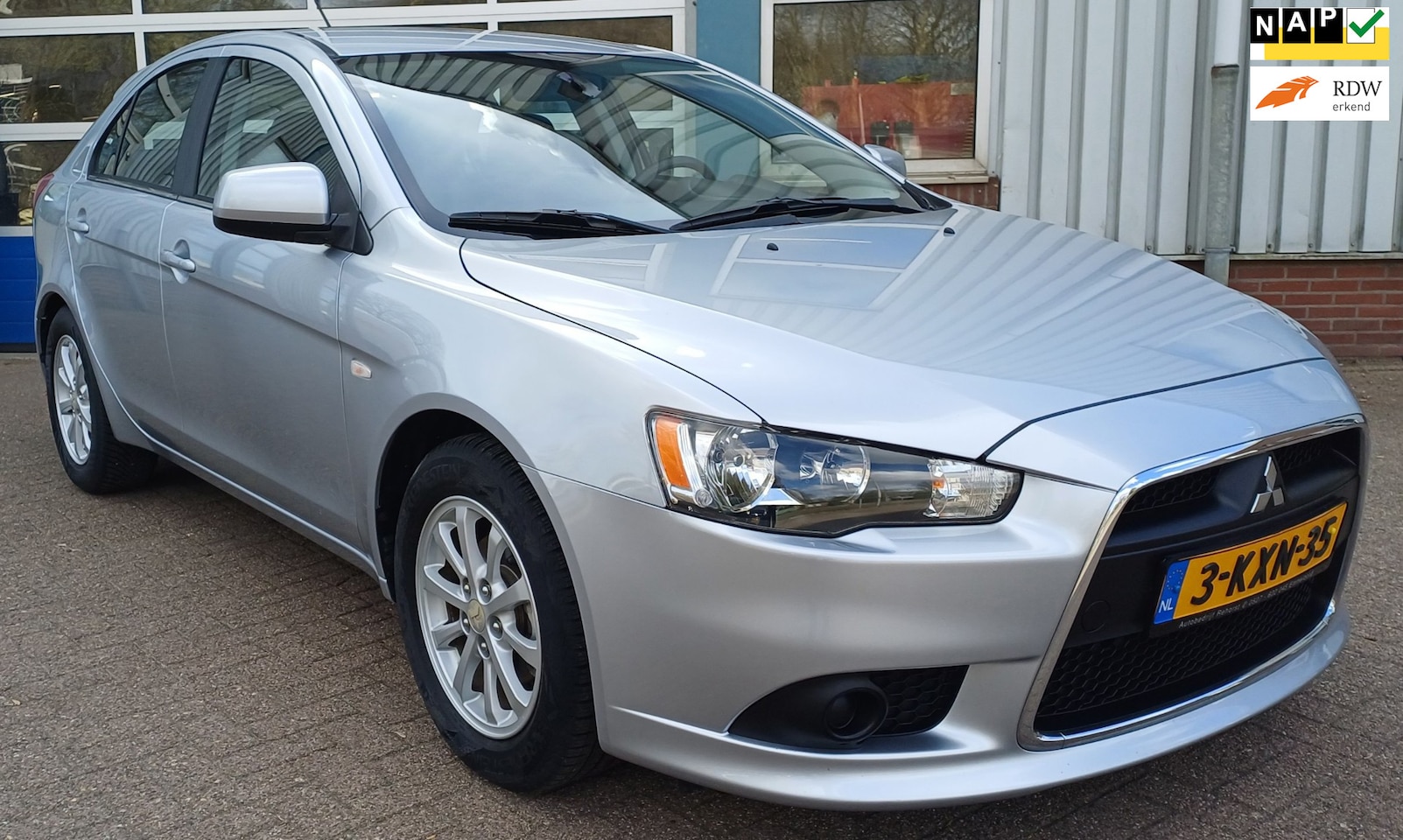 Mitsubishi Lancer Sportback - 1.6 Edition One 1.6 Edition One - AutoWereld.nl