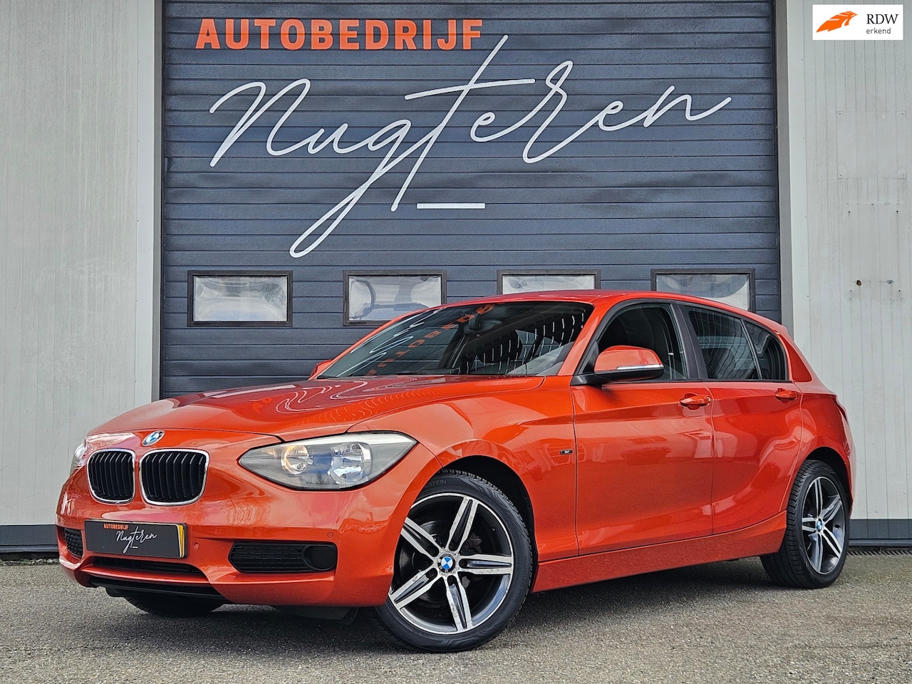 BMW 1-serie - 114i Business+|Carplay|navigatie|Airco| - AutoWereld.nl