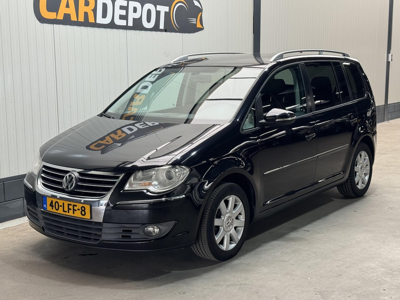 Volkswagen Touran - 1.4 TSI Highline 1.4 TSI Highline - AutoWereld.nl