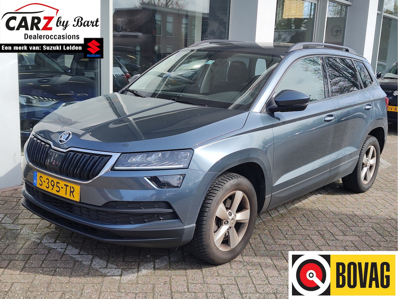 Skoda Karoq - 1.0 TSI AMBITION BUSINESS DSG Navi | Clima | Cruise | Parkeersensoren V+A - AutoWereld.nl
