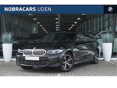 BMW 3-serie Touring - 330e xDrive High Executive M Sport Automaat / Trekhaak / Panoramadak / Sportstoelen / Comf