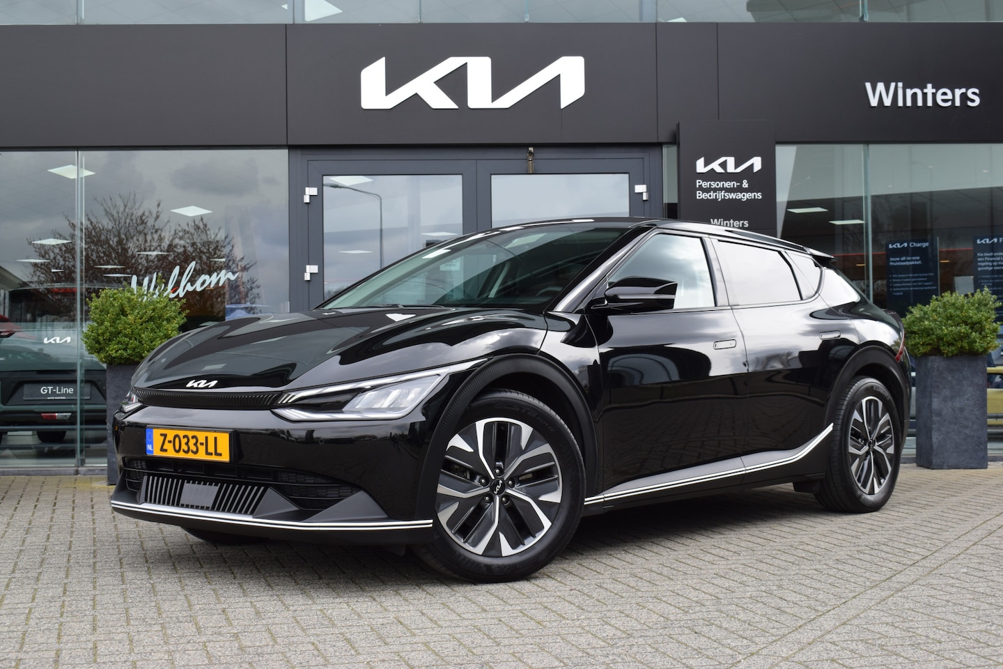 Kia EV6 - Light Edition 58 kWh | Trekhaak | Stuur + Stoelverwarming | Navigatie | Camera | Tot 10Jr. - AutoWereld.nl