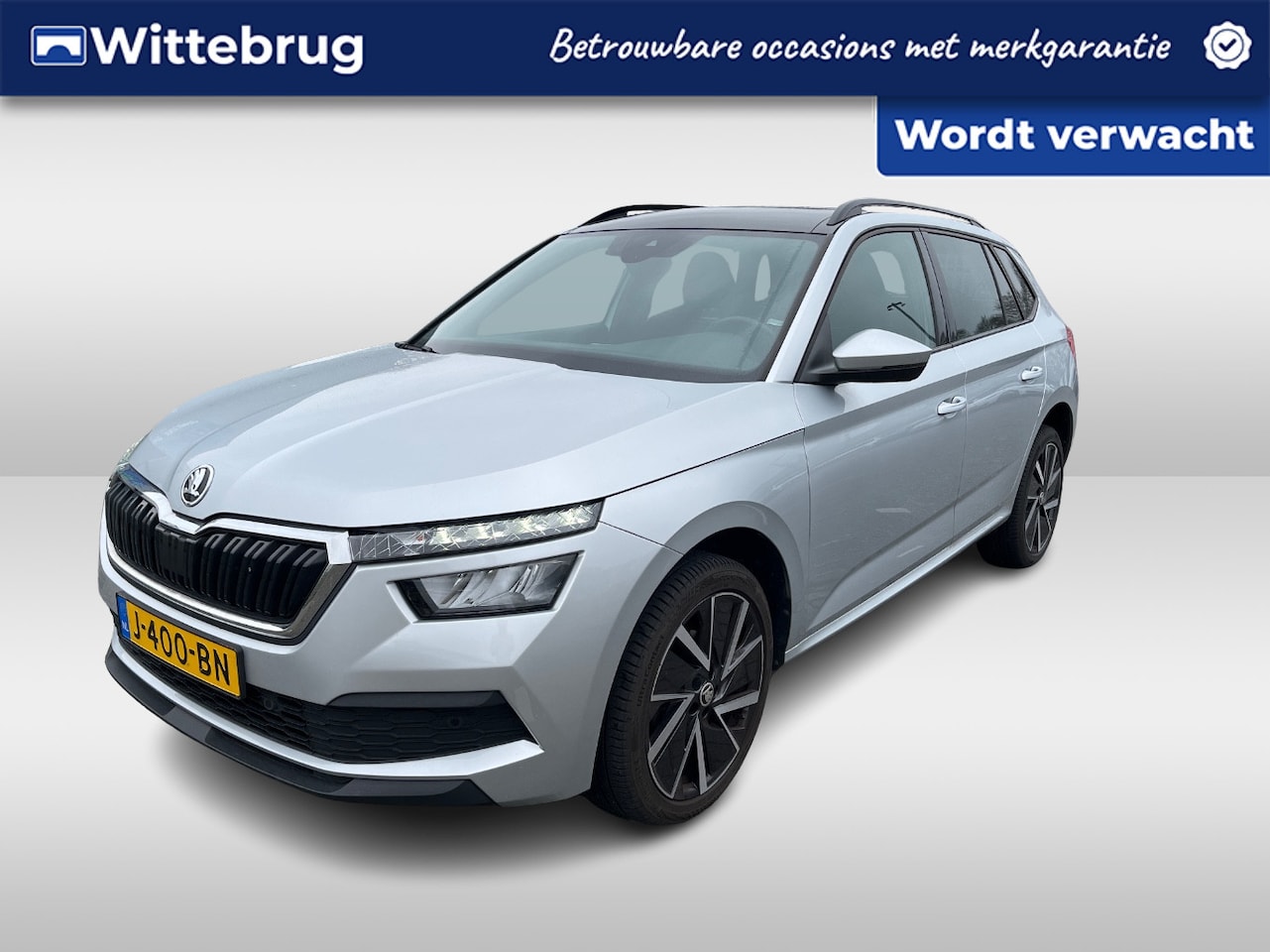 Skoda Kamiq - 1.0 TSI Sport Business / Pano / Navi / stoelverwarming voor / Camera / 18 inch - AutoWereld.nl