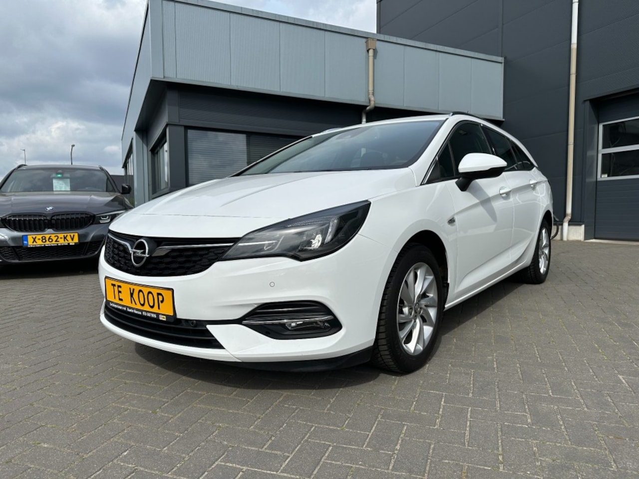 Opel Astra Sports Tourer - Sports Tourer 1.2T Business Elegance Navigatie - AutoWereld.nl