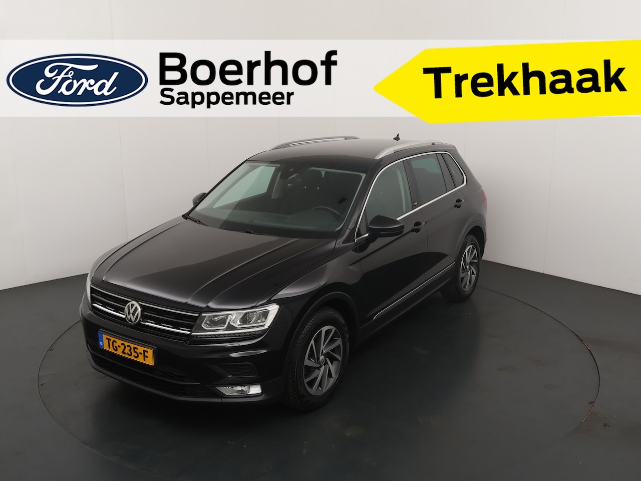 Volkswagen Tiguan - 1.4 TSI ACT Sound | Adap. cruise | Trekhaak | Stoel Verw. | All season | PDC | Clima - AutoWereld.nl