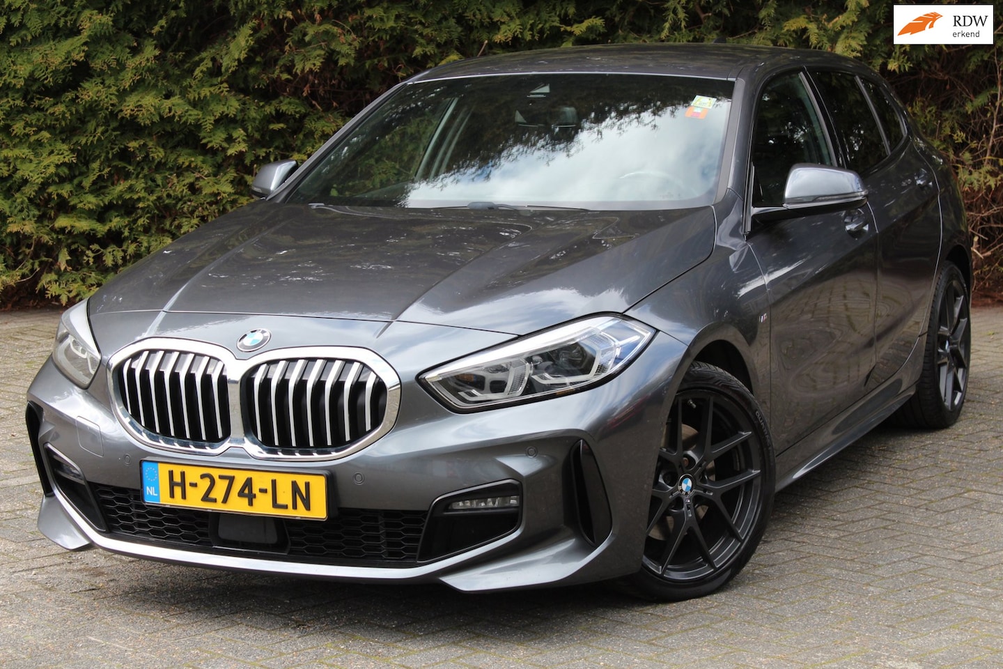 BMW 1-serie - 118d High Executive M 150PK Automaat | M-sportpakket | HUD | Carplay | Stoelverwarming | N - AutoWereld.nl