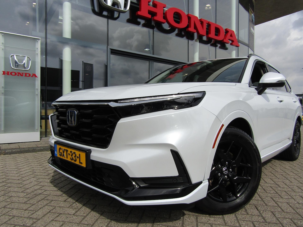 Honda CR-V - 2.0 Full Hybrid 184pk 2WD CVT Elegance + Style pack + Achterklep spoiler - AutoWereld.nl