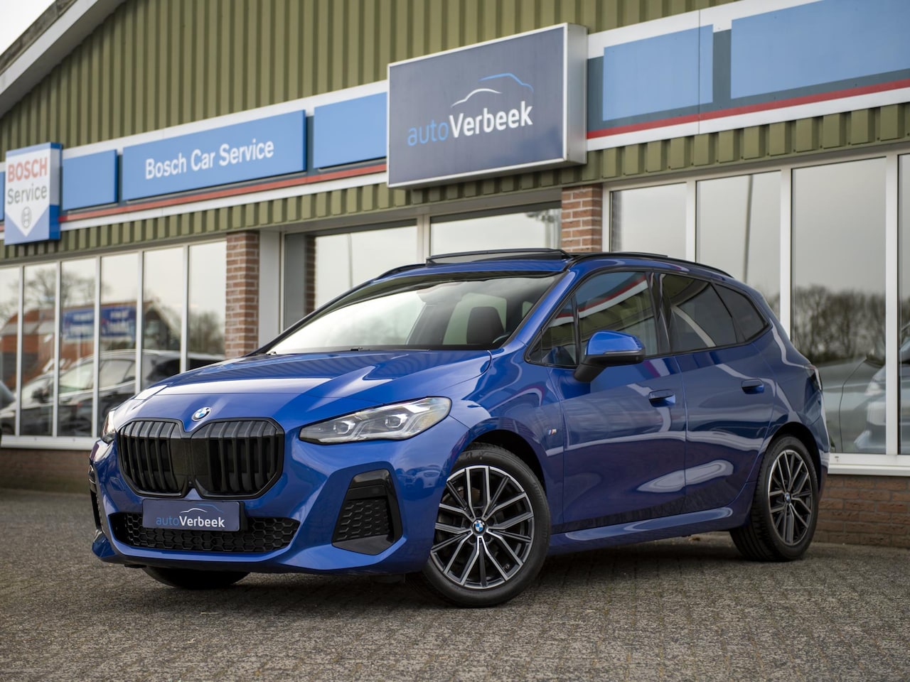 BMW 2-serie Active Tourer - 218i M Sport | Innovation | Travel | Comfort & Trekhaak Pack | El.stoel Memory + Massage | - AutoWereld.nl