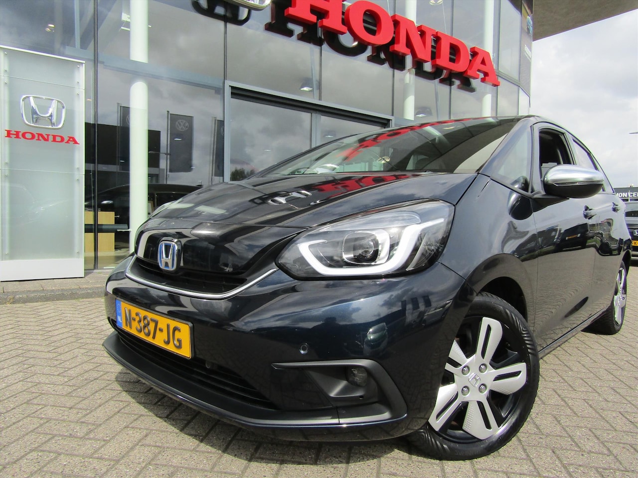 Honda Jazz - 1.5 i-MMD 109pk Hybrid CVT Executive, Trekhaak, Allweatherbanden - AutoWereld.nl