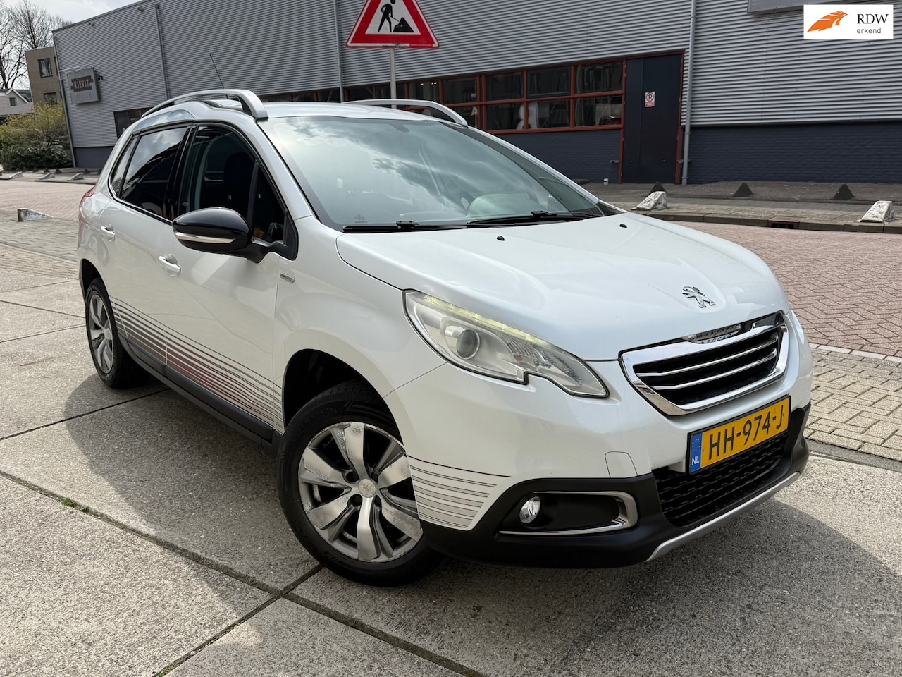 Peugeot 2008 - 1.2 PureTech Urban Cross Half Leer Navi volledig onderhouden - AutoWereld.nl