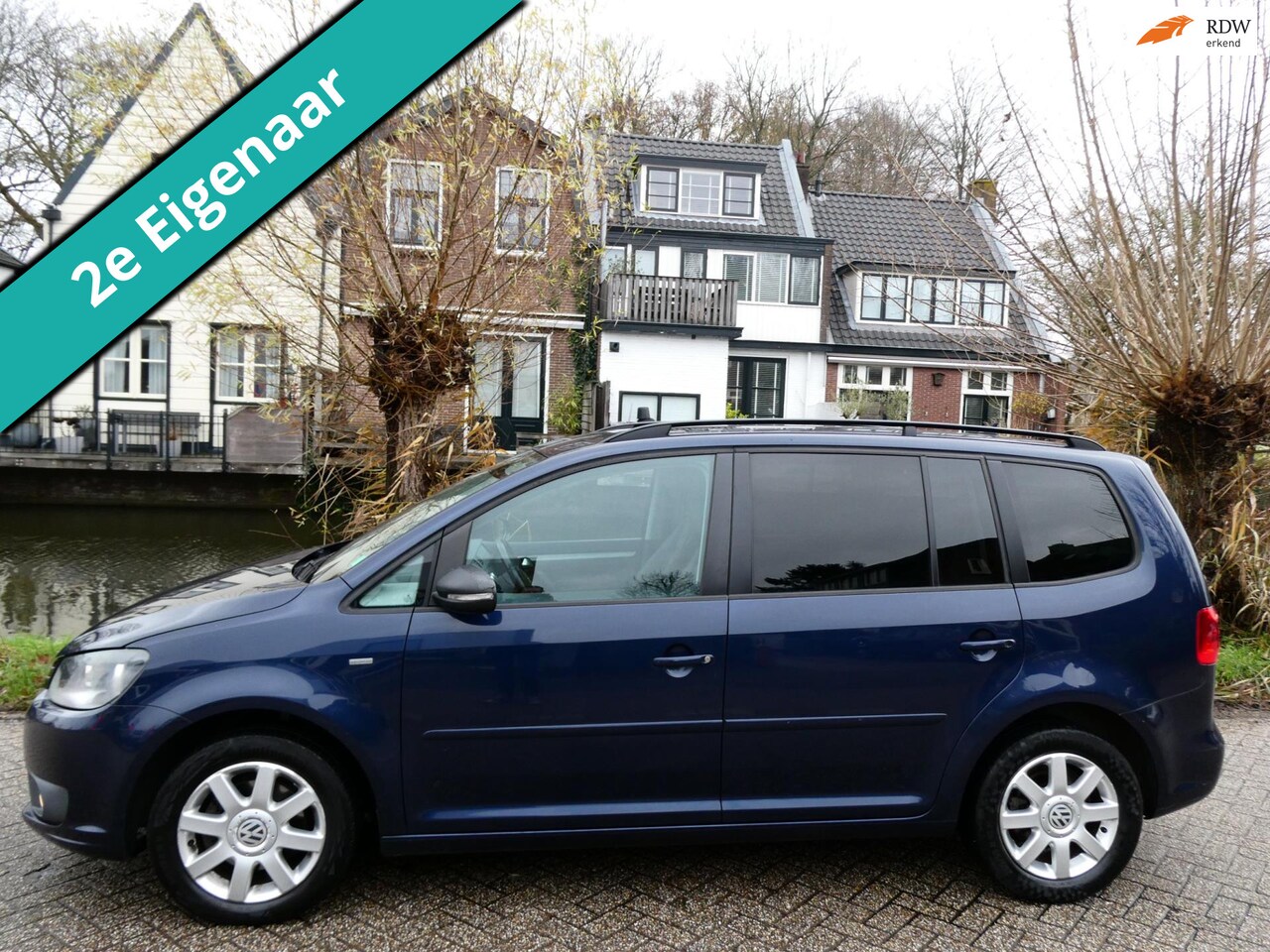 Volkswagen Touran - 1.2 TSI Easyline 7-Persoons 2e eigenaar Clima Cruise - AutoWereld.nl