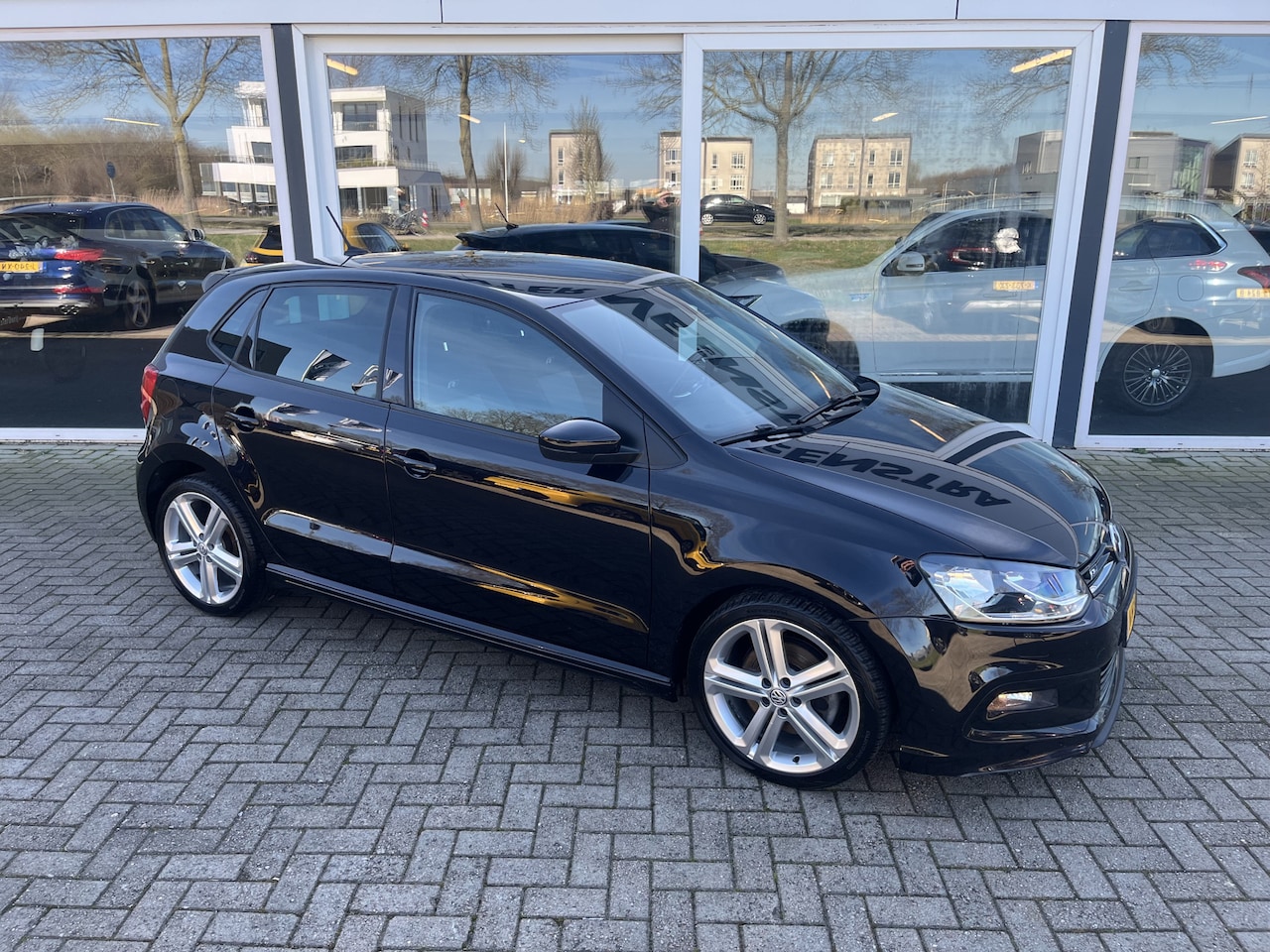 Volkswagen Polo - 1.0 TSI R-line Highline / 17 inch / Clima / Cruise / Carplay /Stoelverwarming - AutoWereld.nl