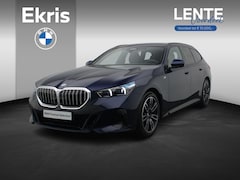 BMW 5-serie Touring - 520d M Sportpakket | Innovation Pack | Travel Pack | Comfort Pack | Trekhaak | Harman-Kard