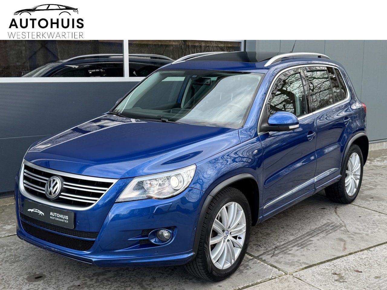 Volkswagen Tiguan - 2.0 TSI 200pk DSG Sport&Style R-line 4Motion Panoramadak Trekhaak Navigatie Camera Leer Xe - AutoWereld.nl