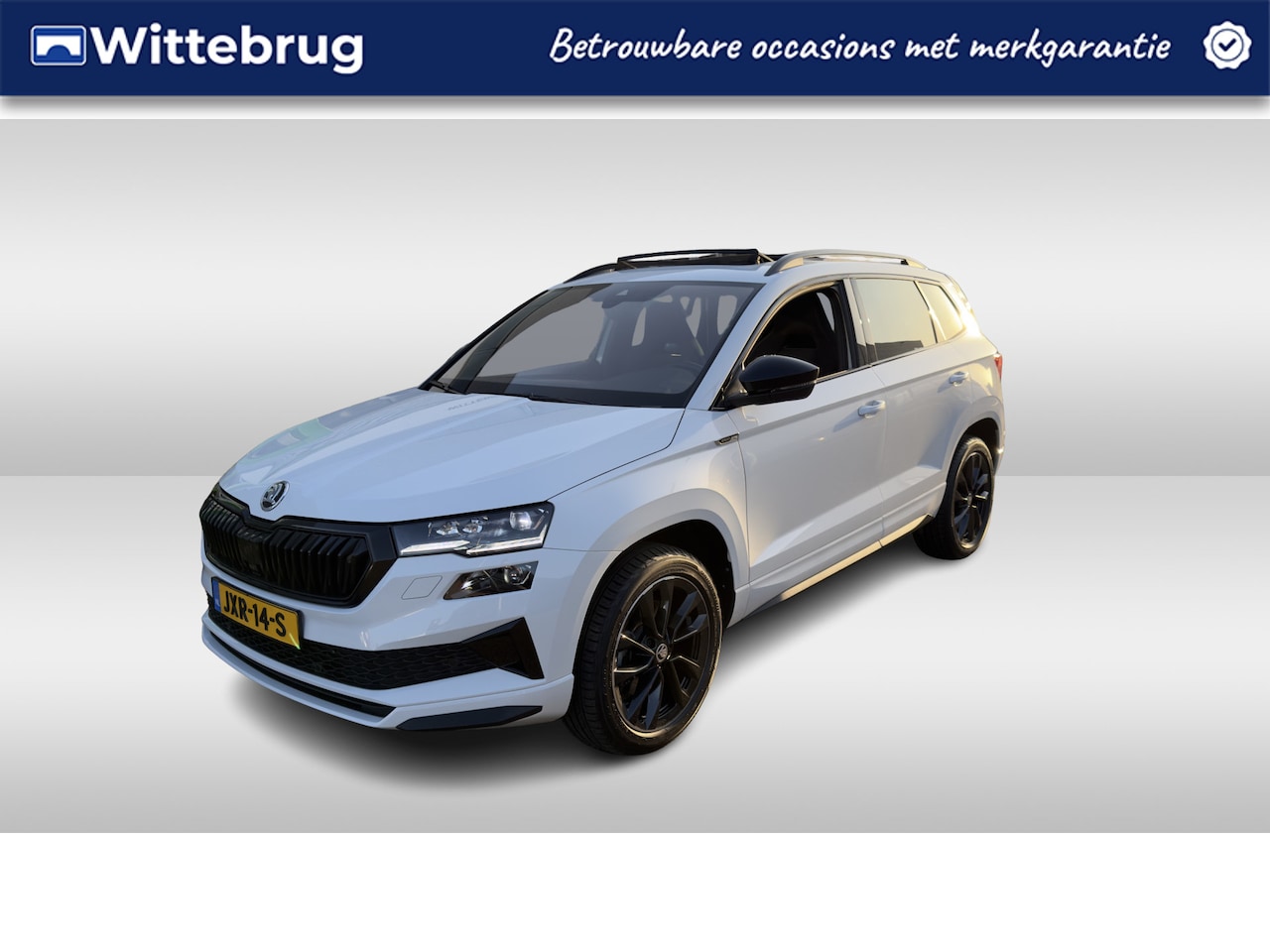 Skoda Karoq - 1.5 TSI ACT Sportline Business / PANODAK /  NAVI / APP.Connect / CAMERA / 18"LMV - AutoWereld.nl