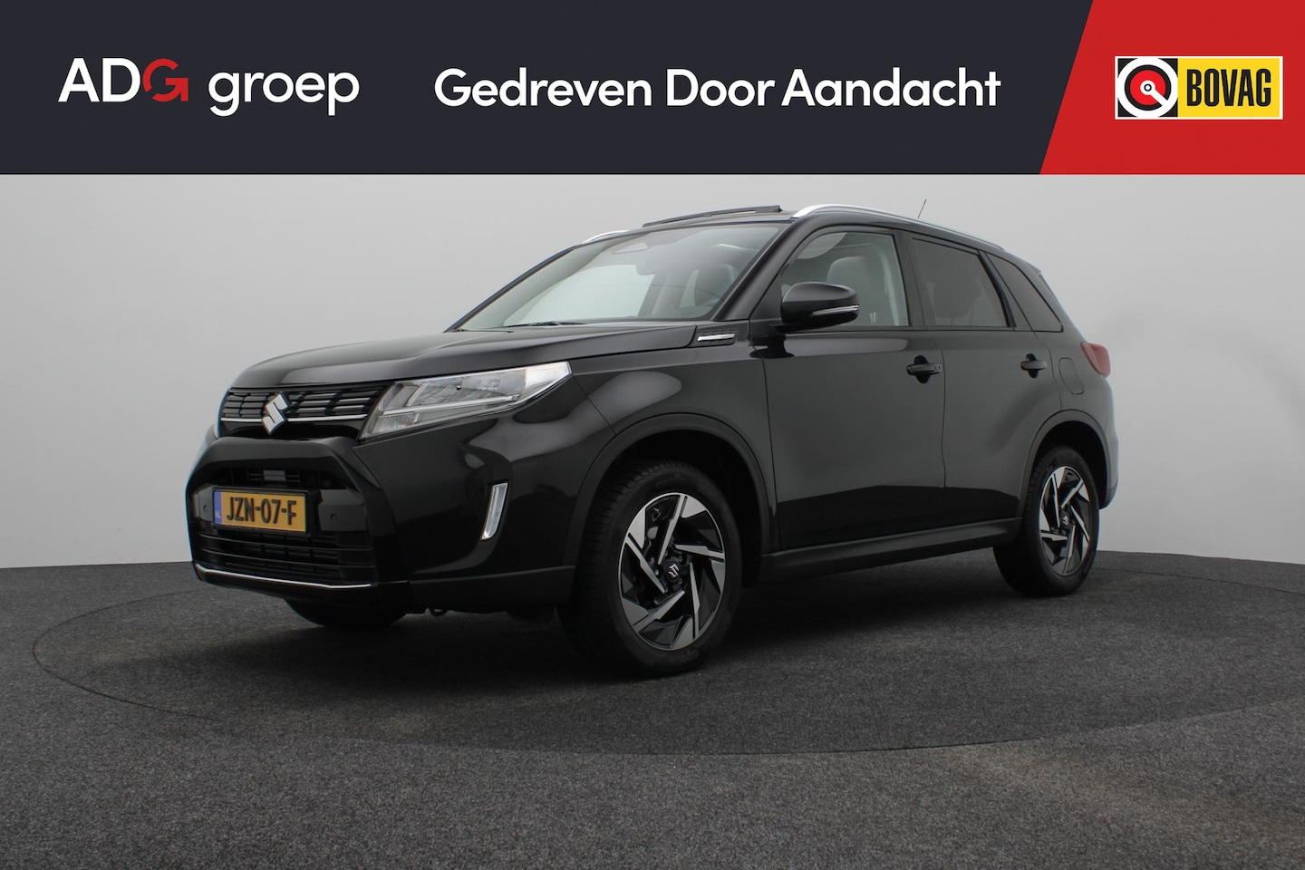 Suzuki Vitara - 1.4 Boosterjet Style Smart Hybrid | Panoramadak | Half Leder | Camera - AutoWereld.nl