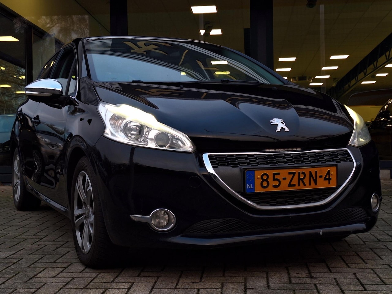 Peugeot 208 - 1.2 VTi Blue Lease Executive Pano Leder Navi bj. 2013 - AutoWereld.nl