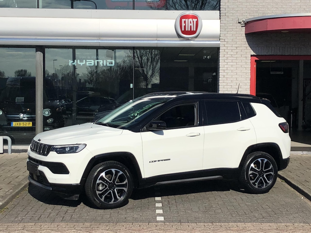 Jeep Compass - 1.5T e-Hybrid Summit AUTOMAAT|LEER|CLIMATE|APPLE/ANDROID|CAMERA|PDC|18" - AutoWereld.nl
