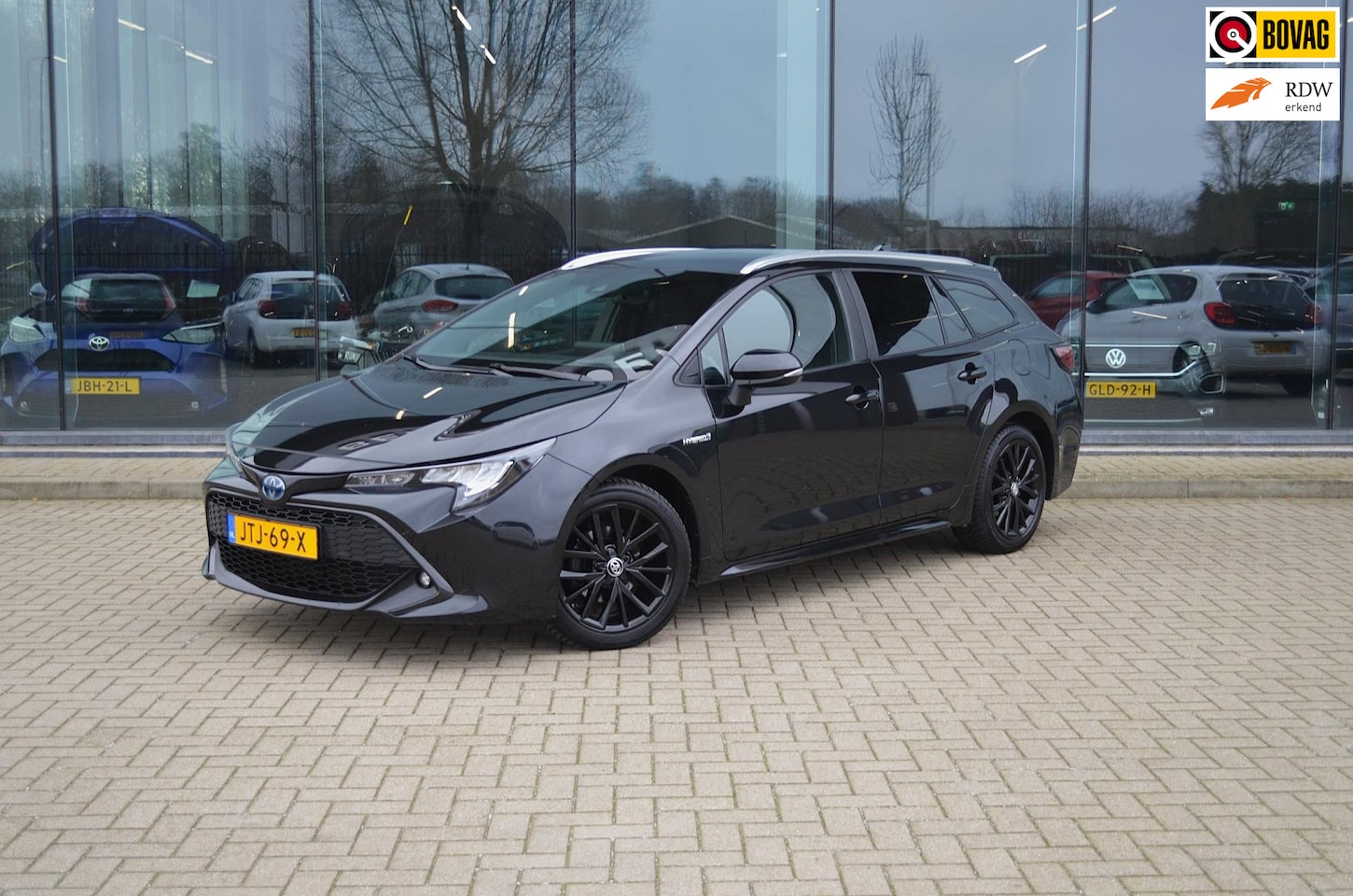 Toyota Corolla Touring Sports - 1.8 Hybrid Dynamic | Trekhaak | Keyless | Stoel & stuurverwarming - AutoWereld.nl