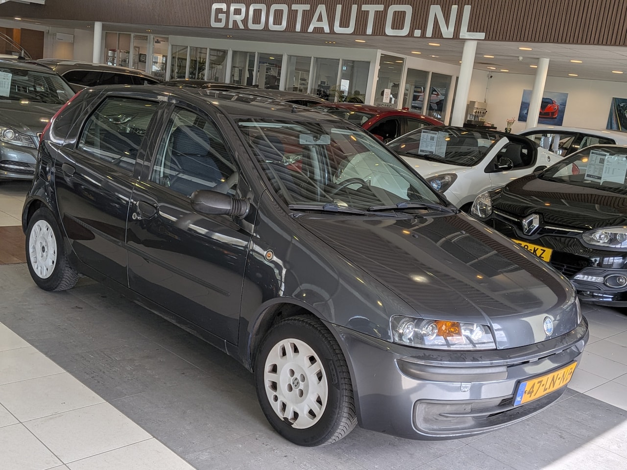 Fiat Punto - 1.2 Dynamic Airco, Stuurbekrachtiging - AutoWereld.nl
