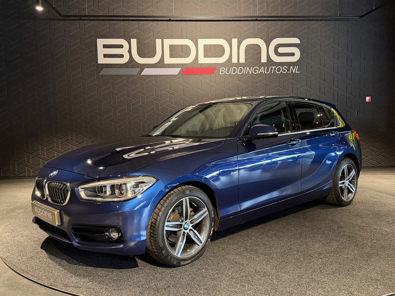 BMW 1-serie - 118i High Exe | Sport-Line | Leder | Gr Navi | Camera - AutoWereld.nl